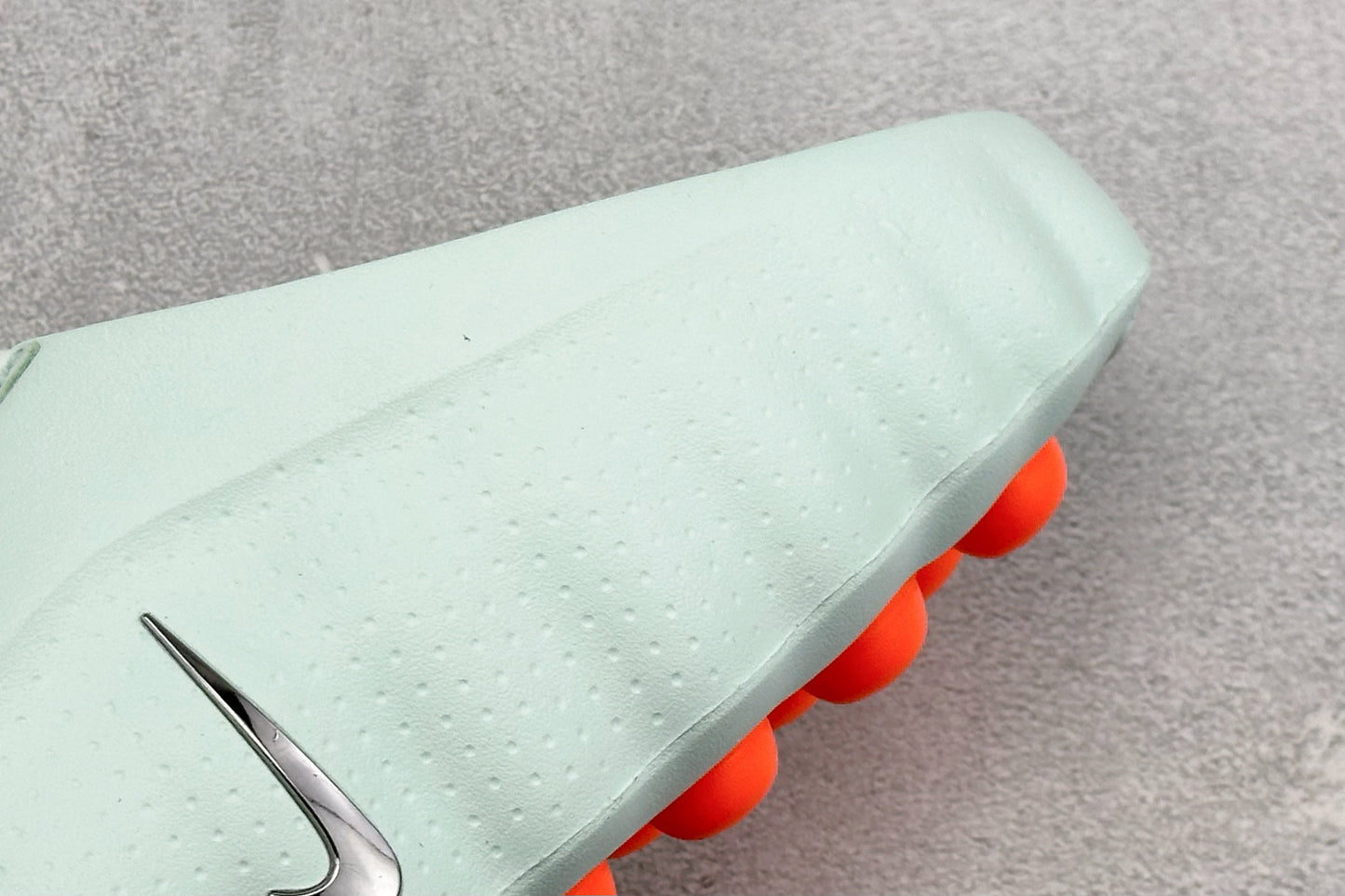 Nike Unisex "Neuro-Ball" Slide Sandal in Mint Green/Orange