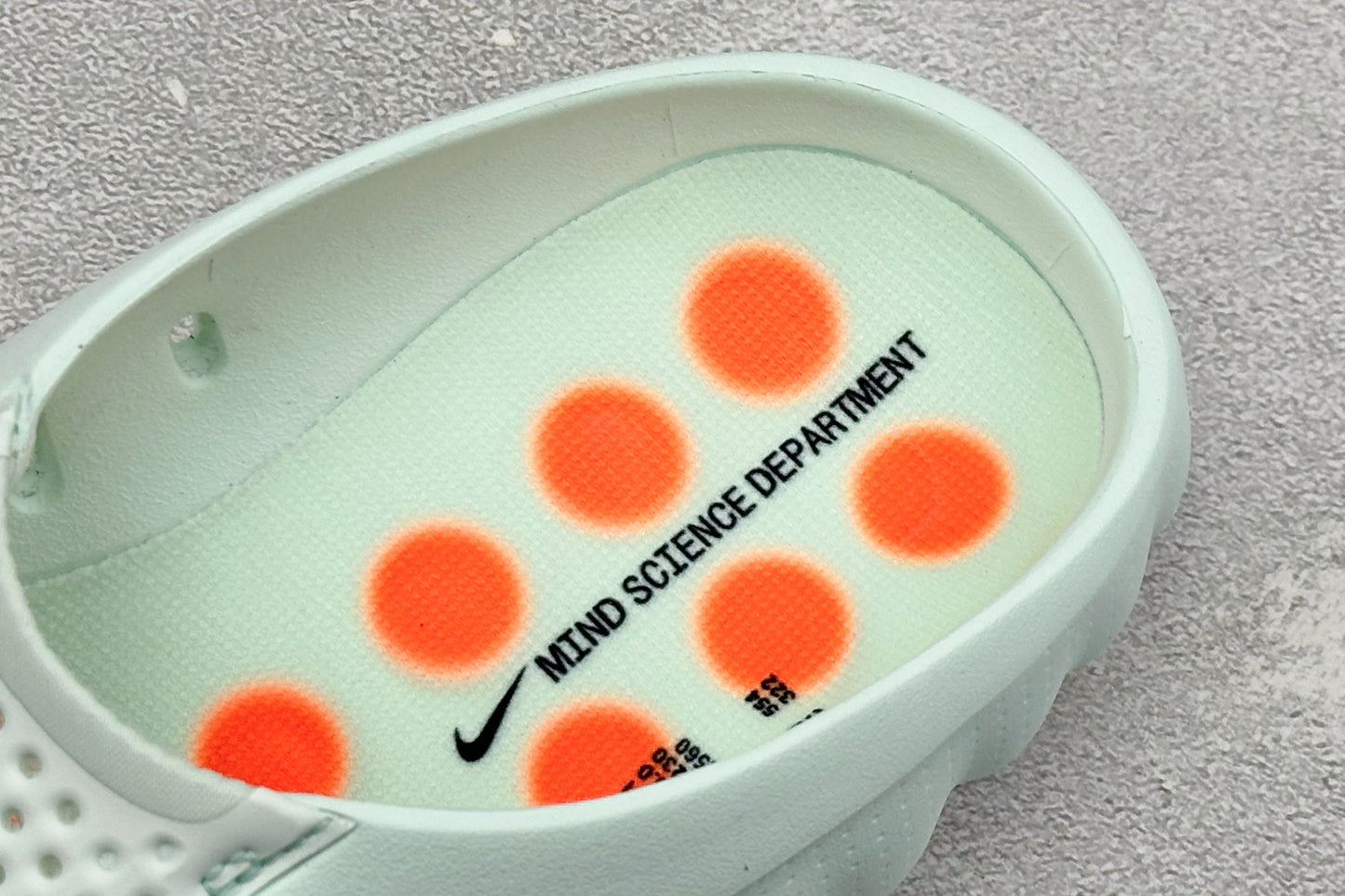 Nike Unisex "Neuro-Ball" Slide Sandal in Mint Green/Orange